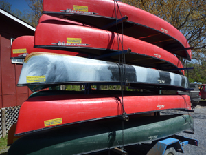 trailer of canoes